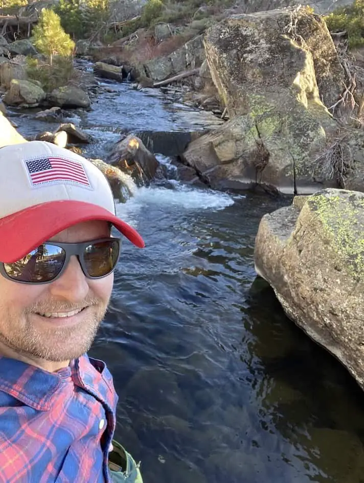 Fly fishing in pocket water in the backcountry mountains