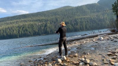 Fly casting after a long hike into the wilderness