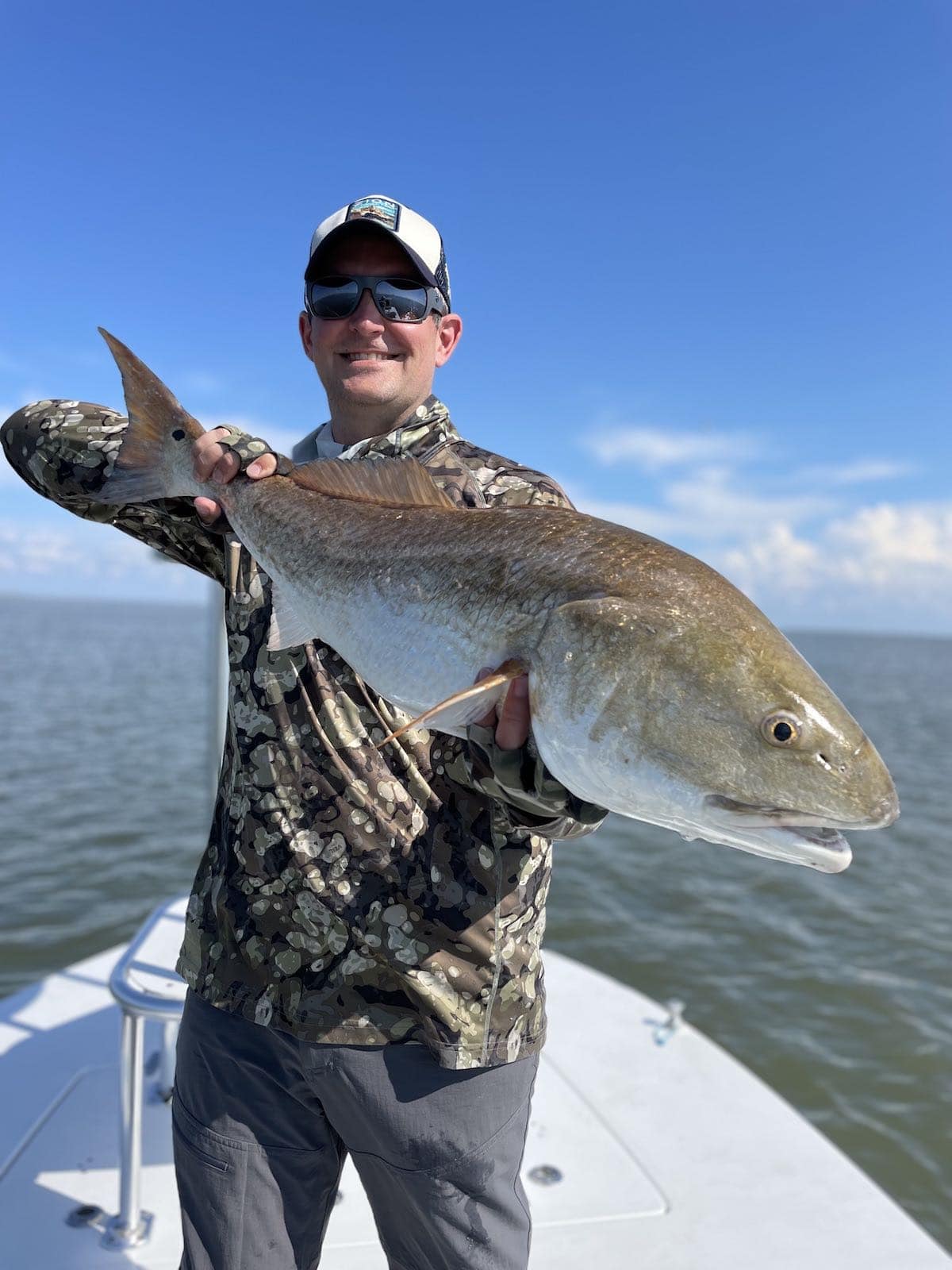 Big redfish caught while fly fishing in Louisiana